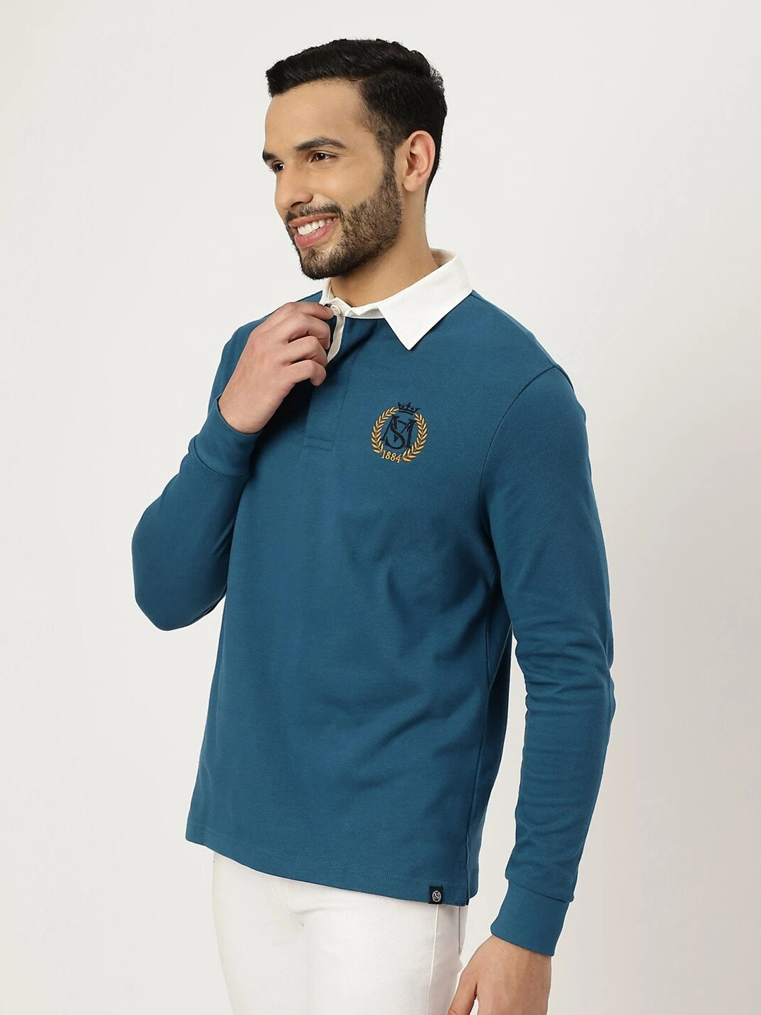 

Marks & Spencer Men Teal Polo Collar Cotton T-shirt