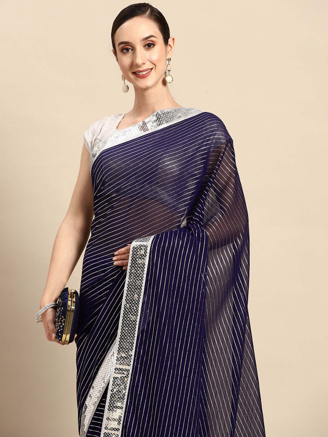 

Tikhi Imli Blue Striped Sequinned Saree