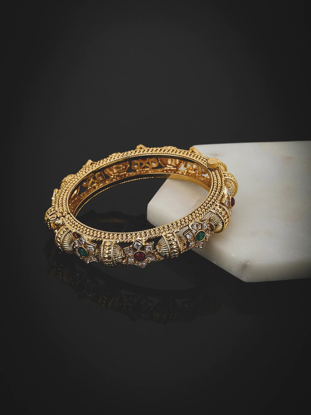 

Carlton London Gold-Plated Red & Green Kundan-Studded angle