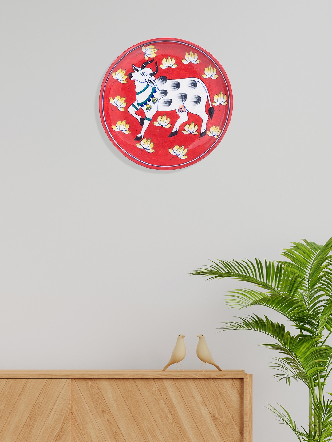 

Golden Peacock Red & White Handpainted Pottery Cow Desing Wall Plate