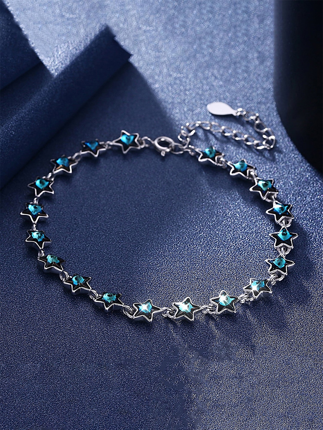 

Yellow Chimes Women Silver-Toned & Blue Crystals Silver-Plated Charm Bracelet