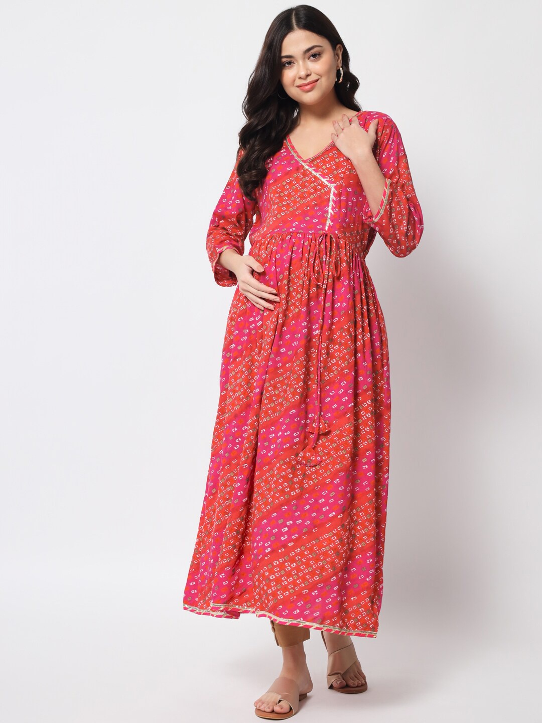 

Aujjessa Bandhani Printed Flared Sleeves Gotta Patti Maternity Kurta, Fuchsia