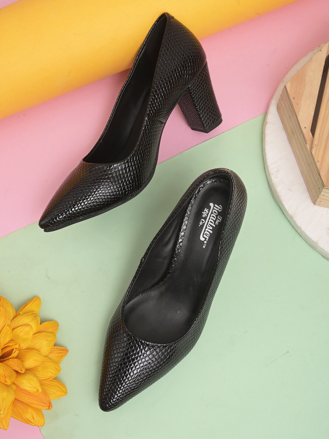 

Roadster Women Black Textured Block Pump Heels