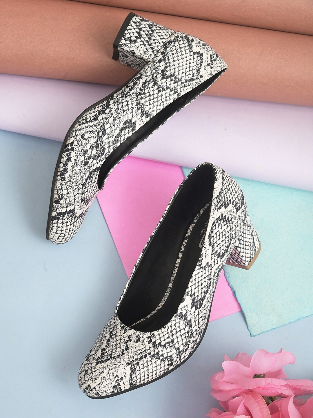 

Roadster Women White Textured Block Pump Heels
