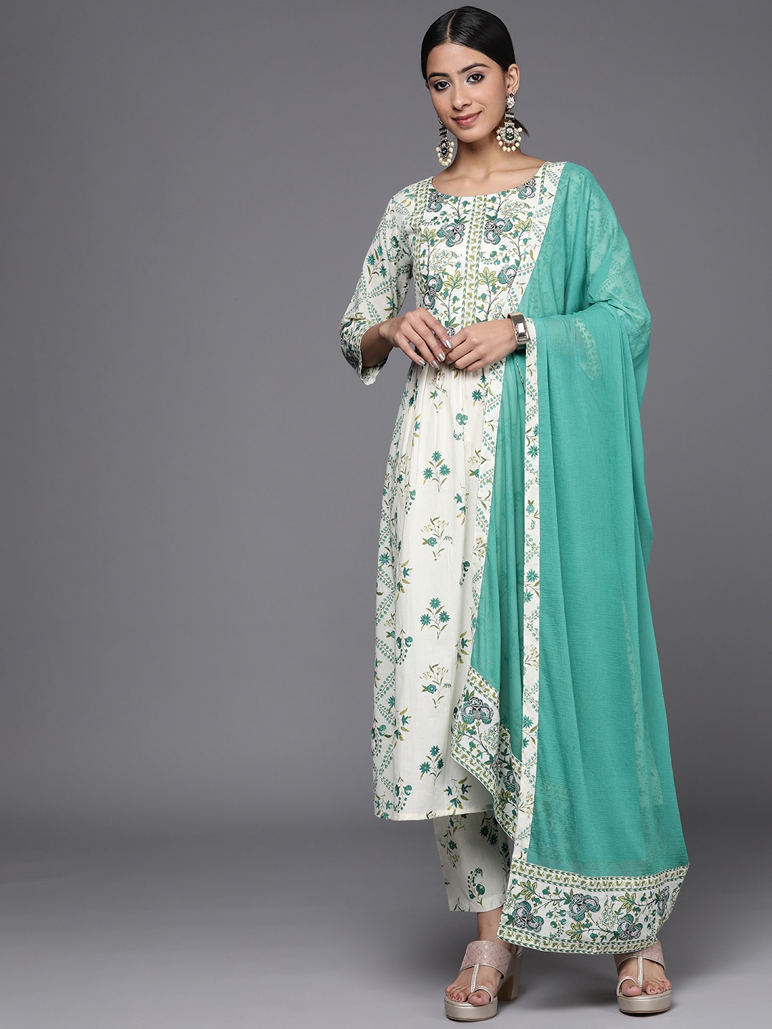 

Indo Era Women Off White Floral Printed Empire Kurta with Trousers & With Dupatta