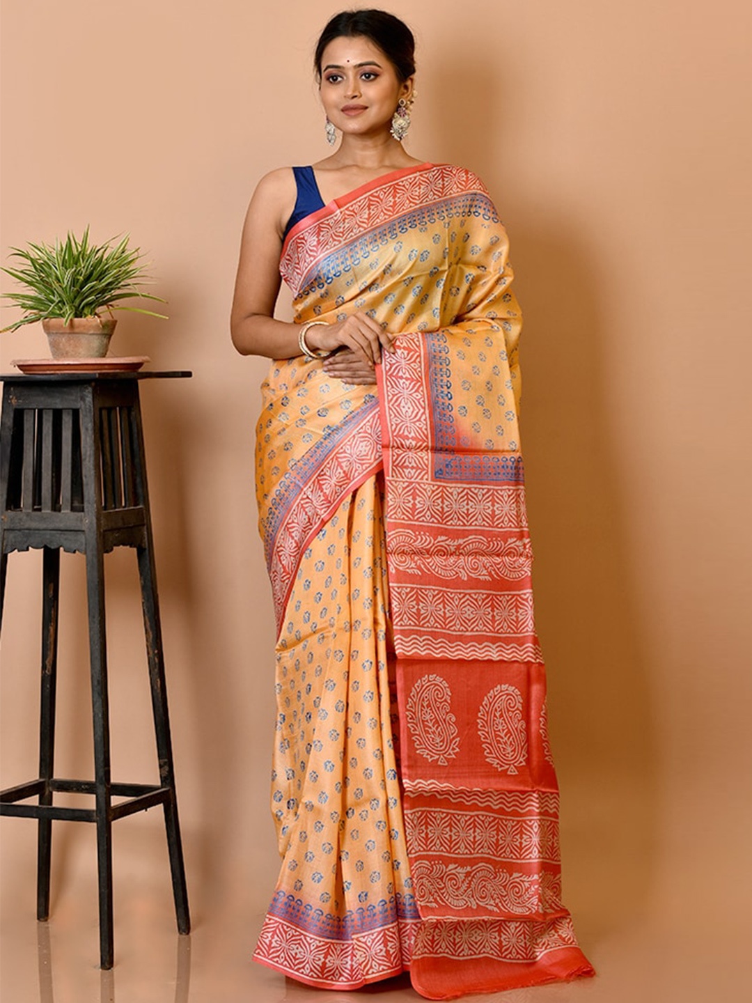 

AllSilks Yellow & Coral Ethnic Motifs Silk Blend Tussar Saree