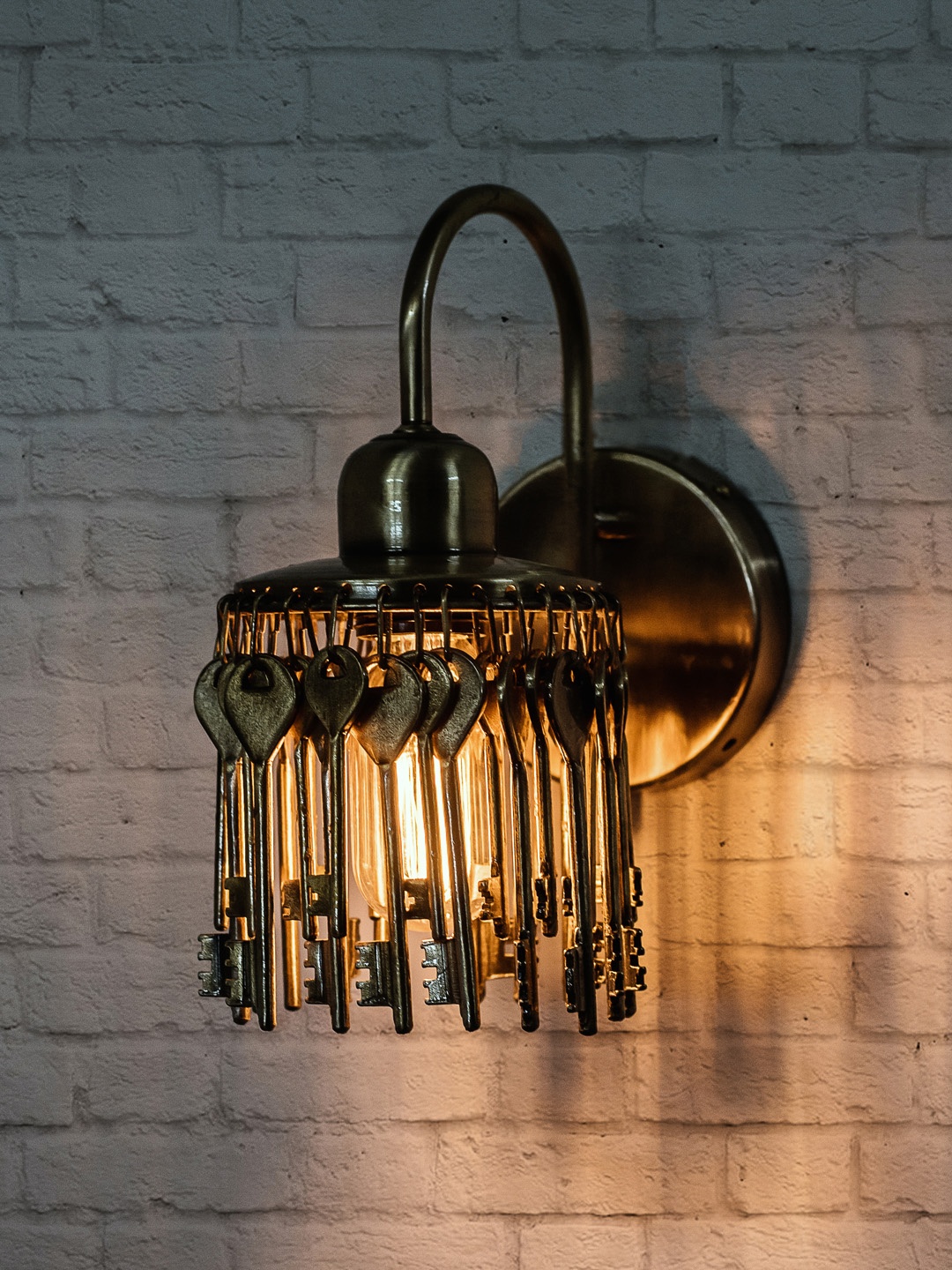 

Fos Lighting Gold-Toned Treasure Keys Armed Sconce
