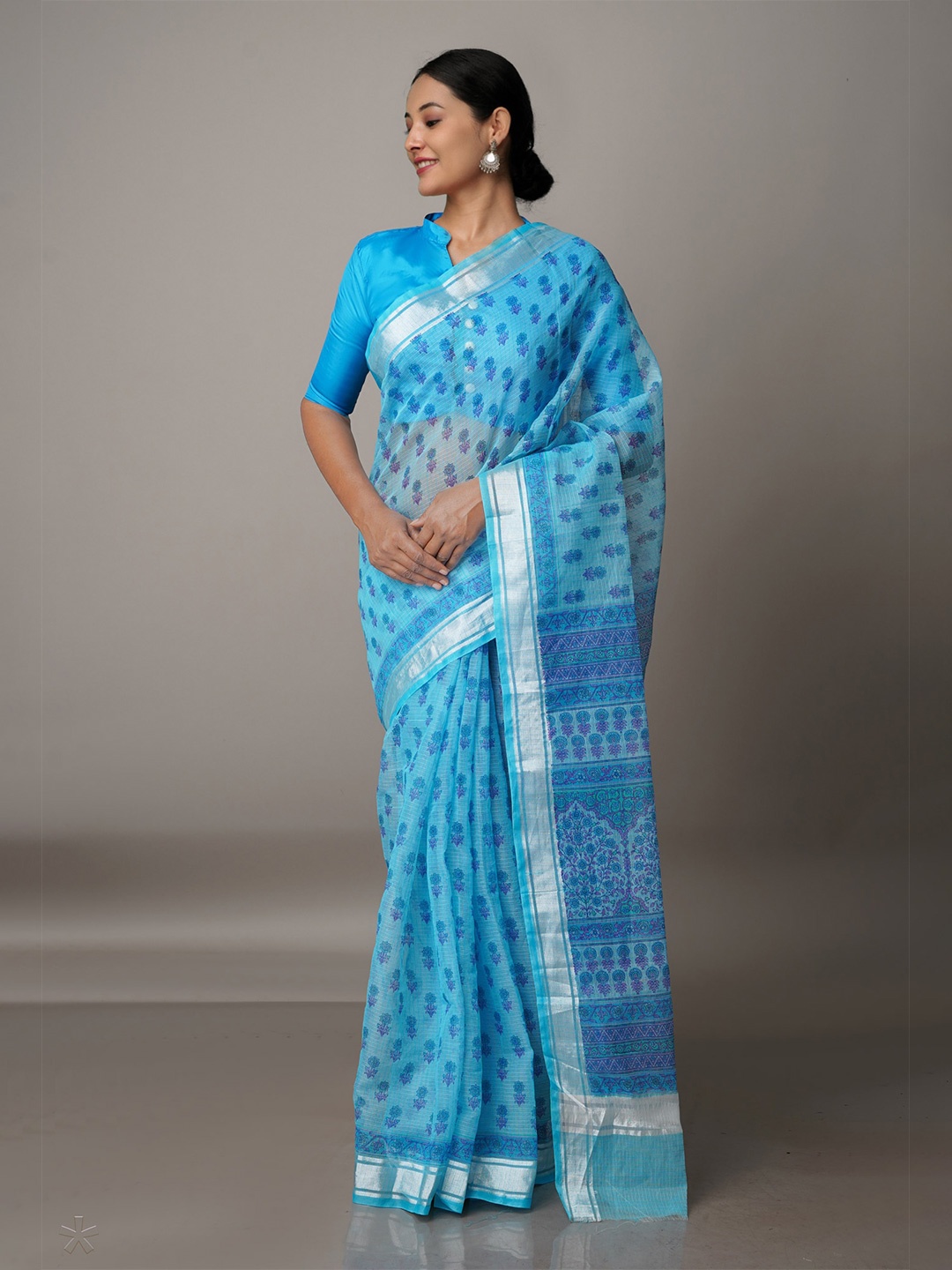 

Unnati Silks Blue & Silver-Toned Ethnic Motifs Zari Pure Cotton Kota Saree