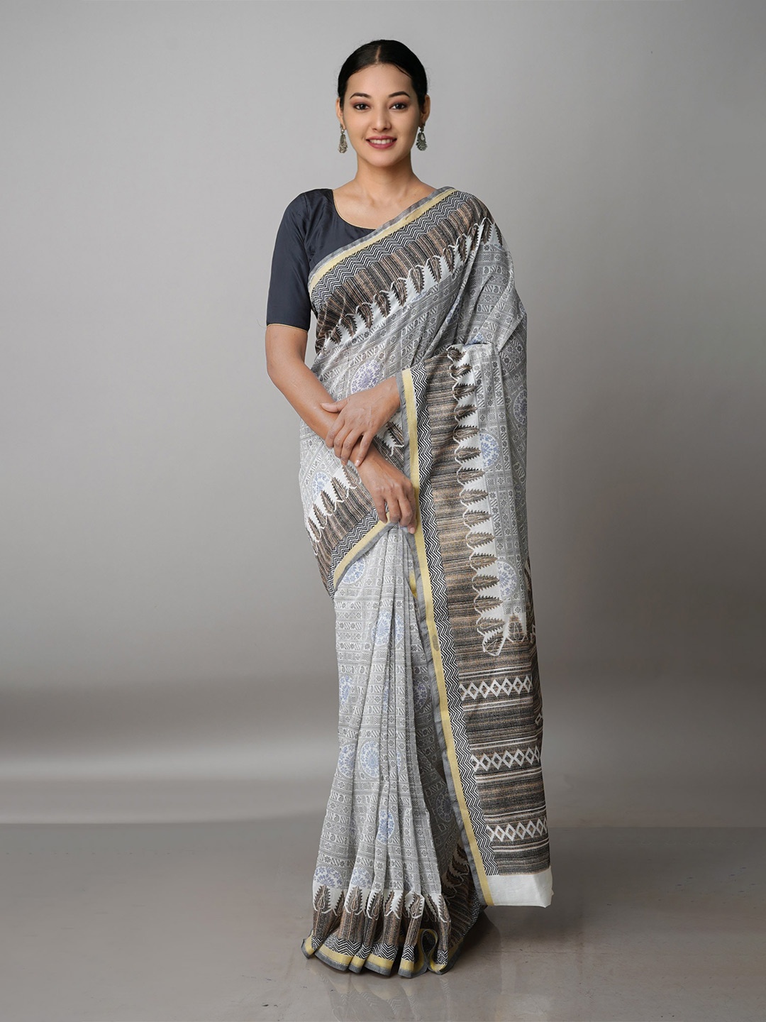 

Unnati Silks Grey & Black Ethnic Motifs Zari Silk Cotton Chanderi Saree