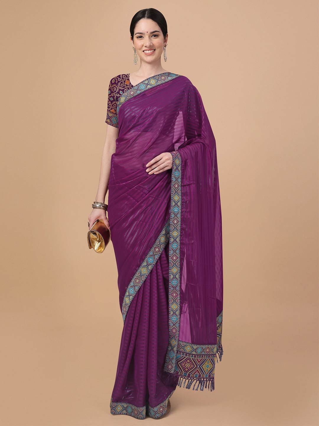 

Mitera Purple & Blue Embellished Embroidered Art Silk Saree