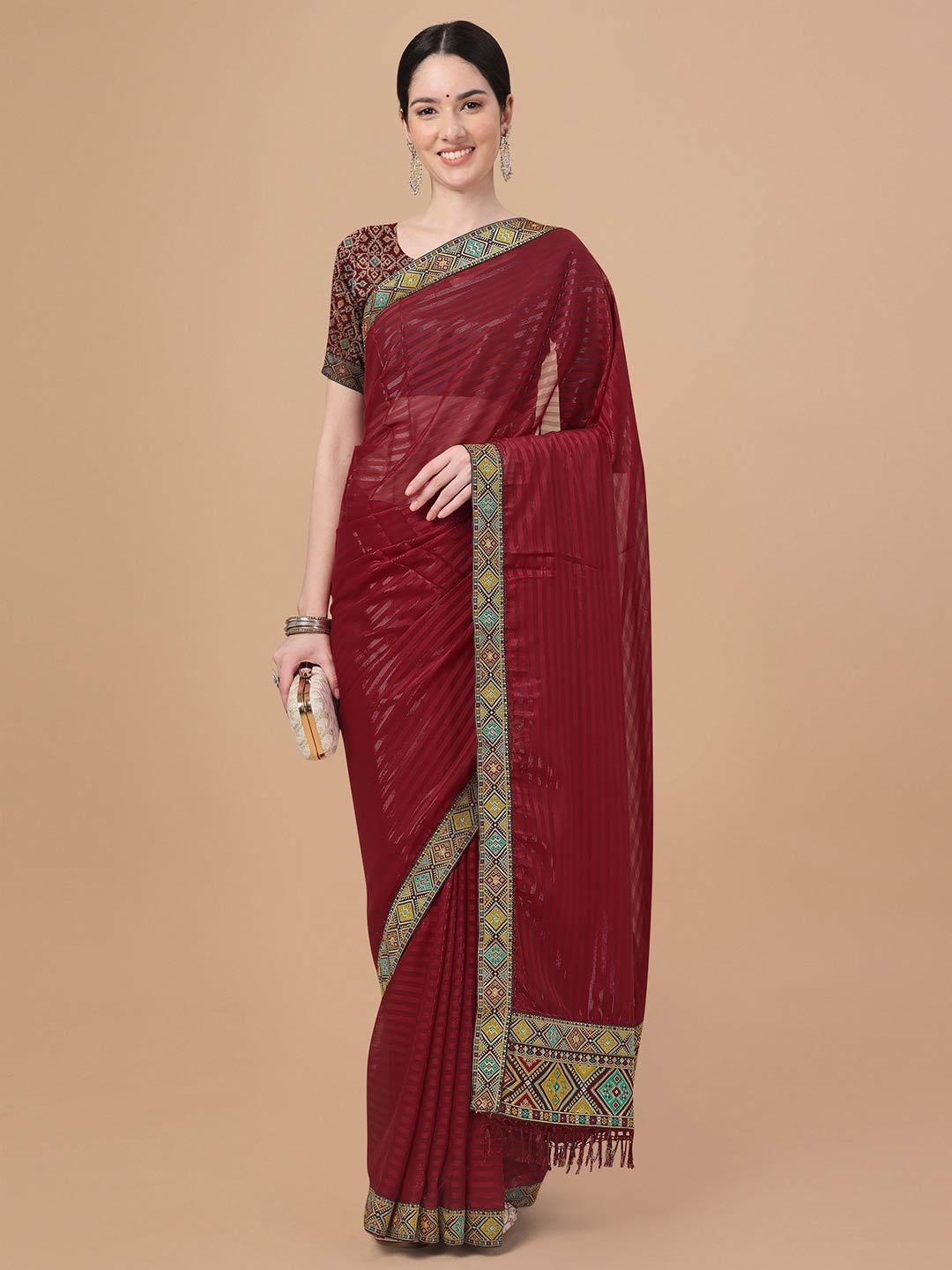 

Mitera Maroon & Green Striped Embroidered Art Silk Saree