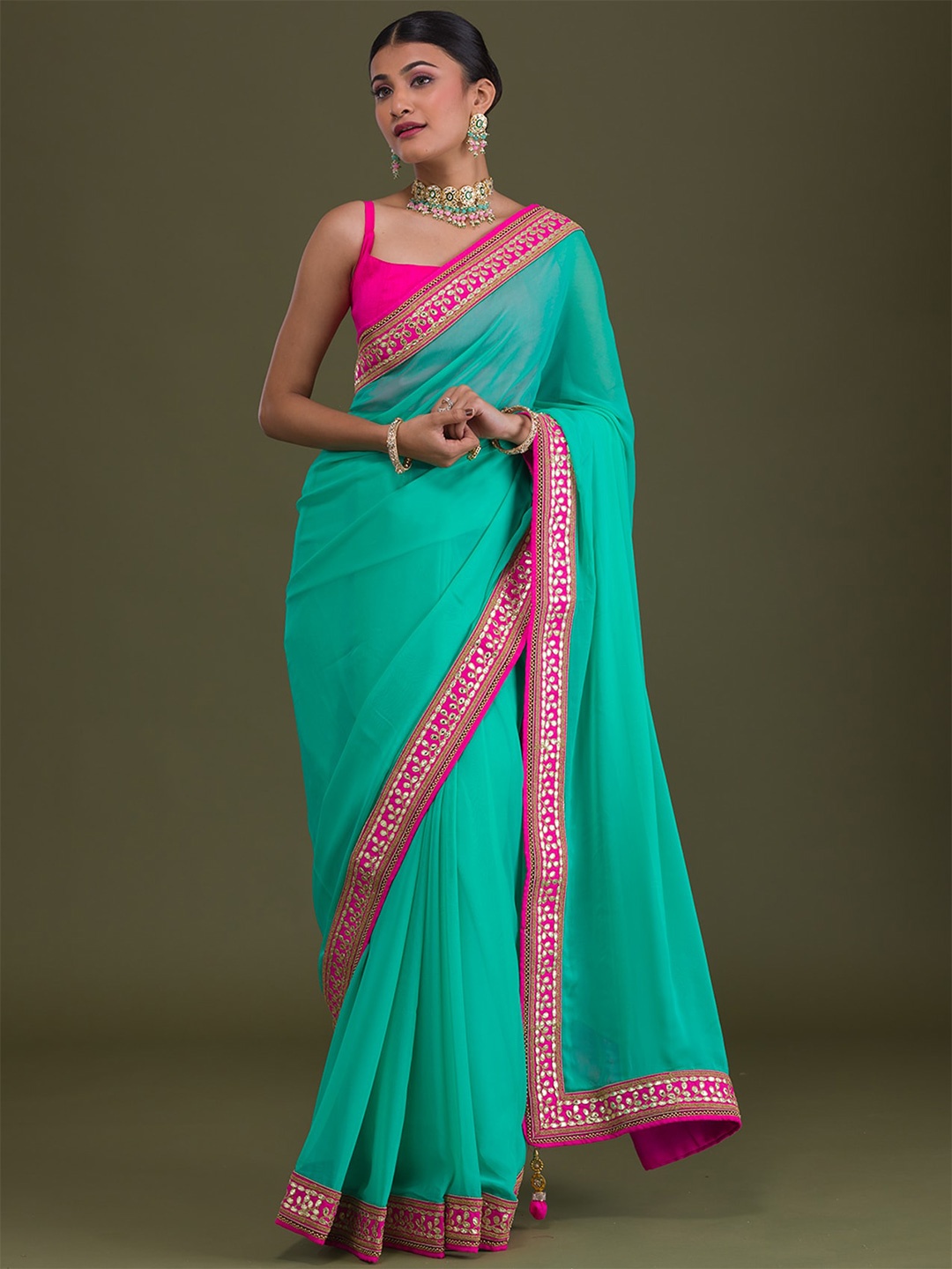 

Koskii Green & Pink Embroidered Saree