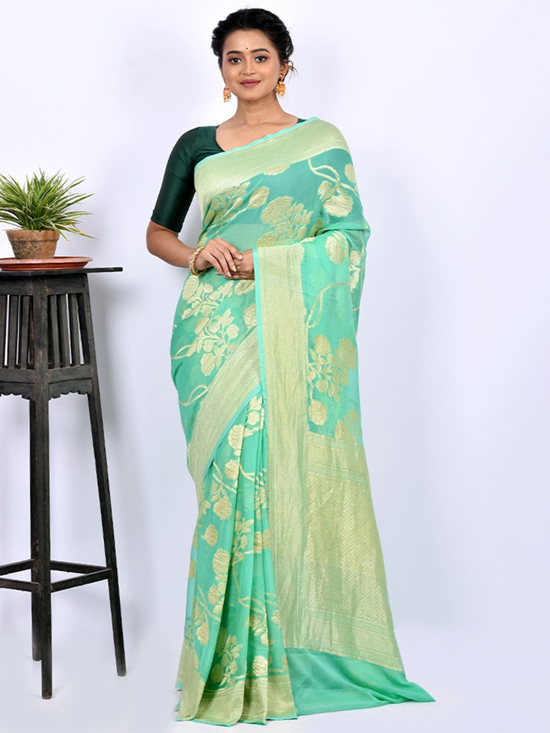 

AllSilks Green & Gold-Toned Floral Zari Pure Georgette Saree