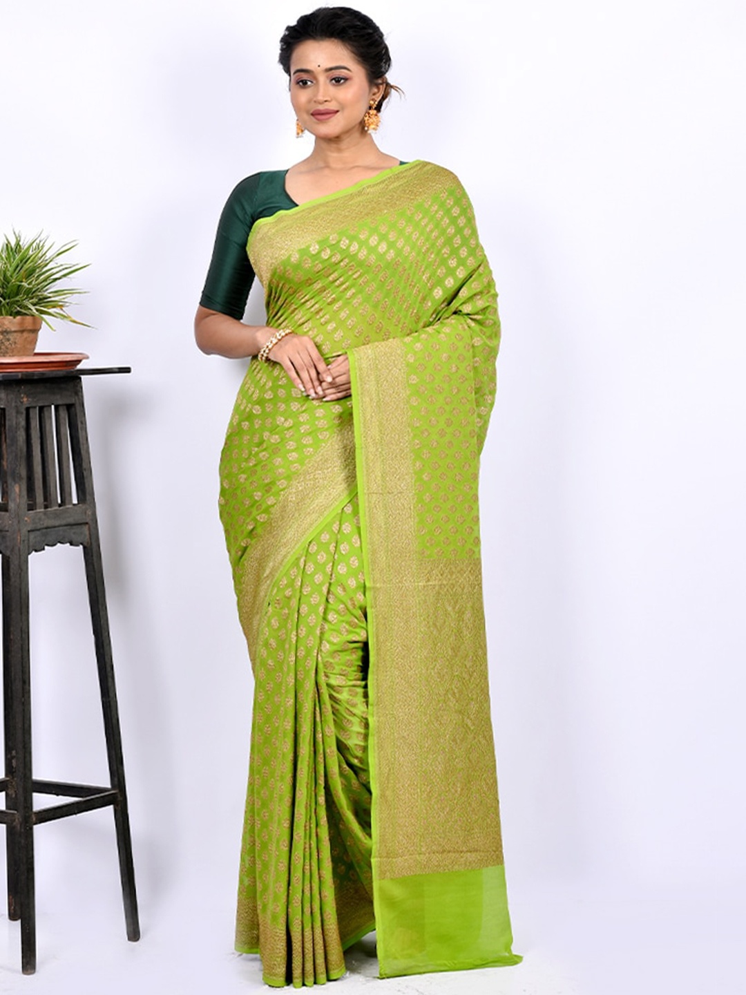 

AllSilks Green & Gold-Toned Woven Design Pure Georgette Zari Saree