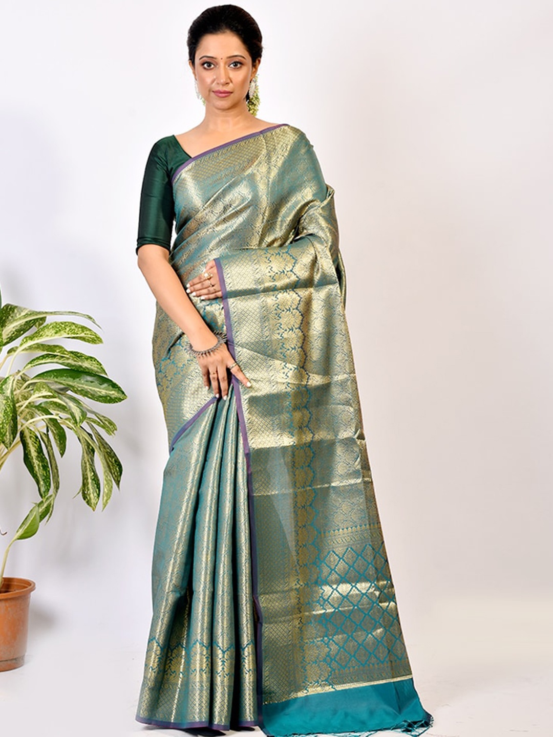 

AllSilks Sea Green & Purple Ethnic Motifs Zari Silk Blend Saree