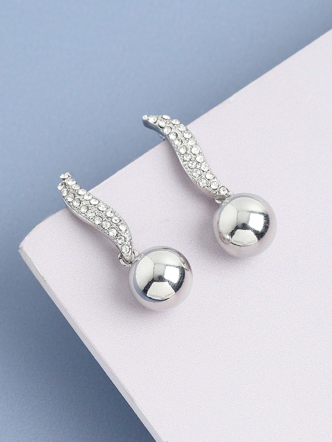 

SOHI Silver-Plated Contemporary Drop Earrings
