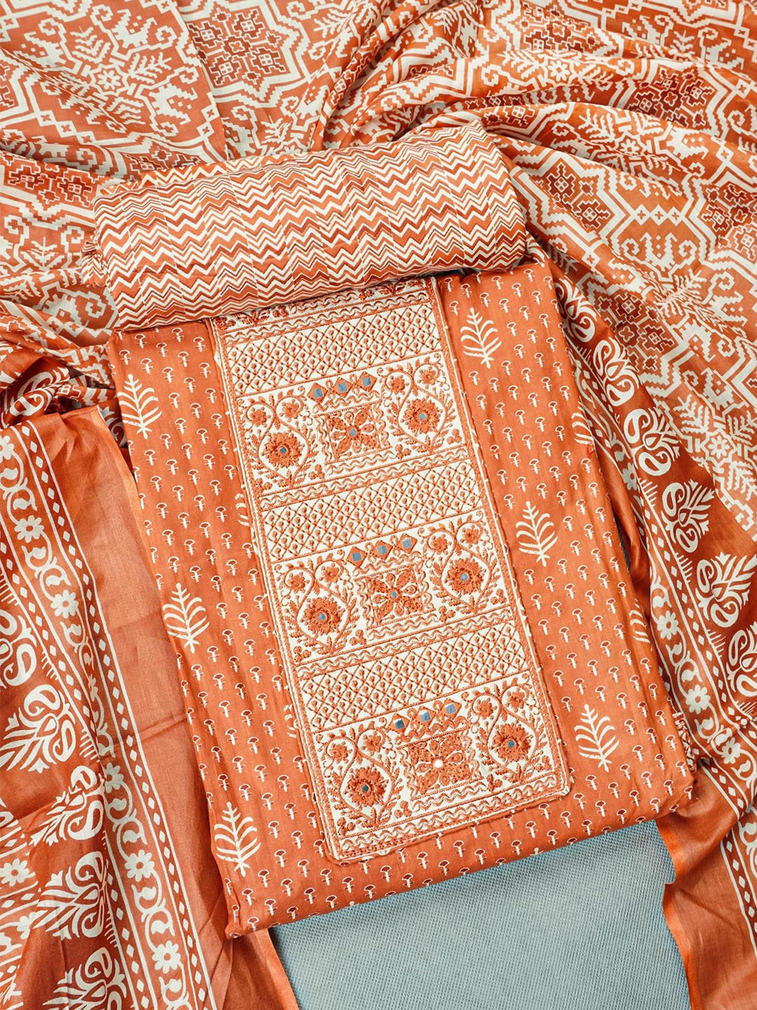 

Kalamandir Rust Orange & White Pure Cotton Unstitched Dress Material