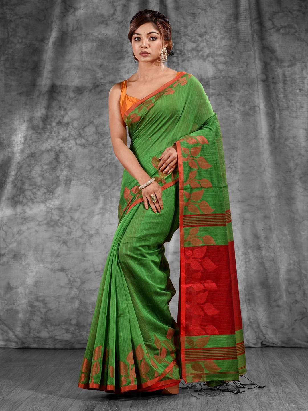 

Charukriti Green & Red Woven Design Saree