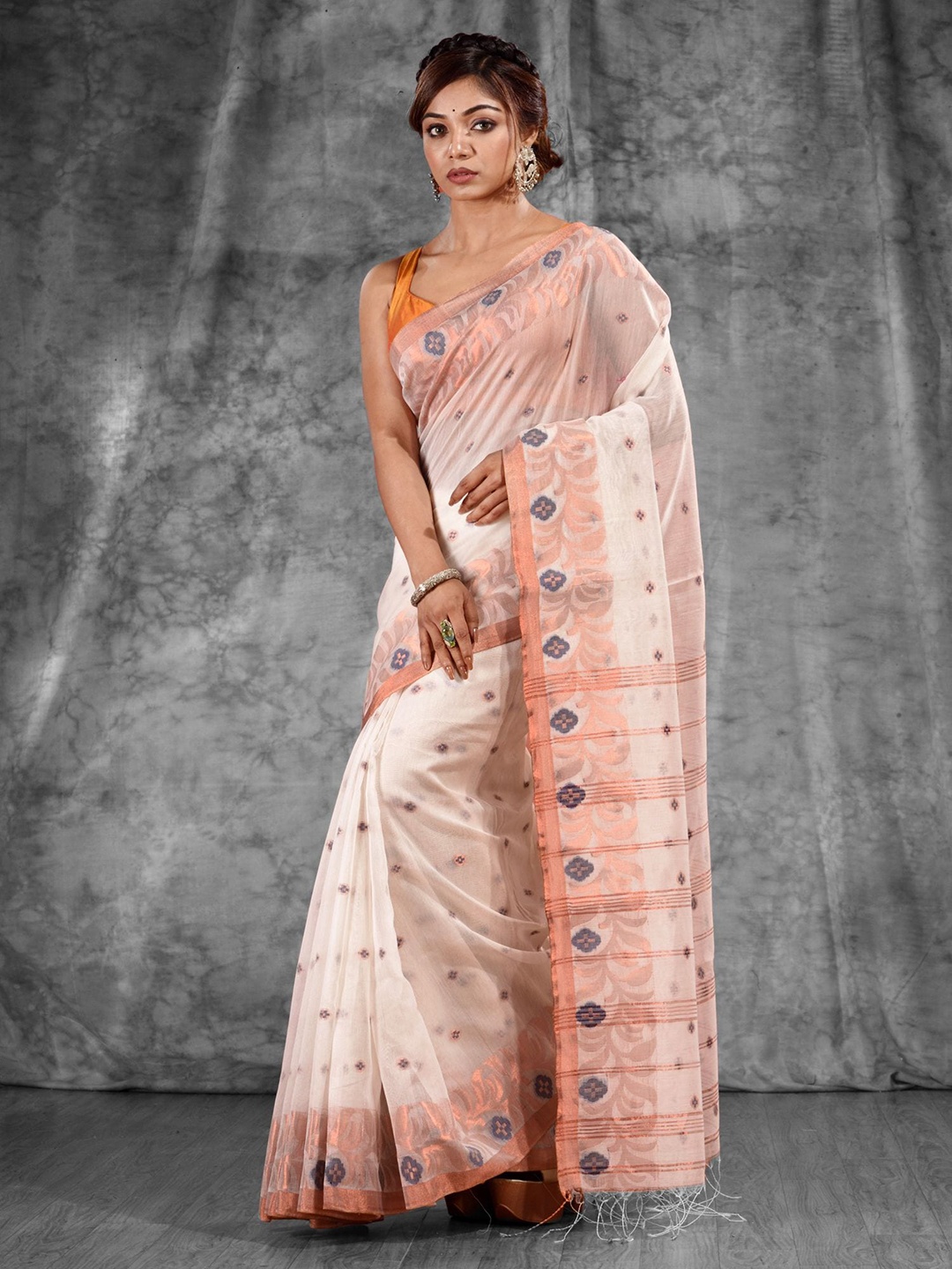 

Charukriti White & Orange Woven Design Zari Saree