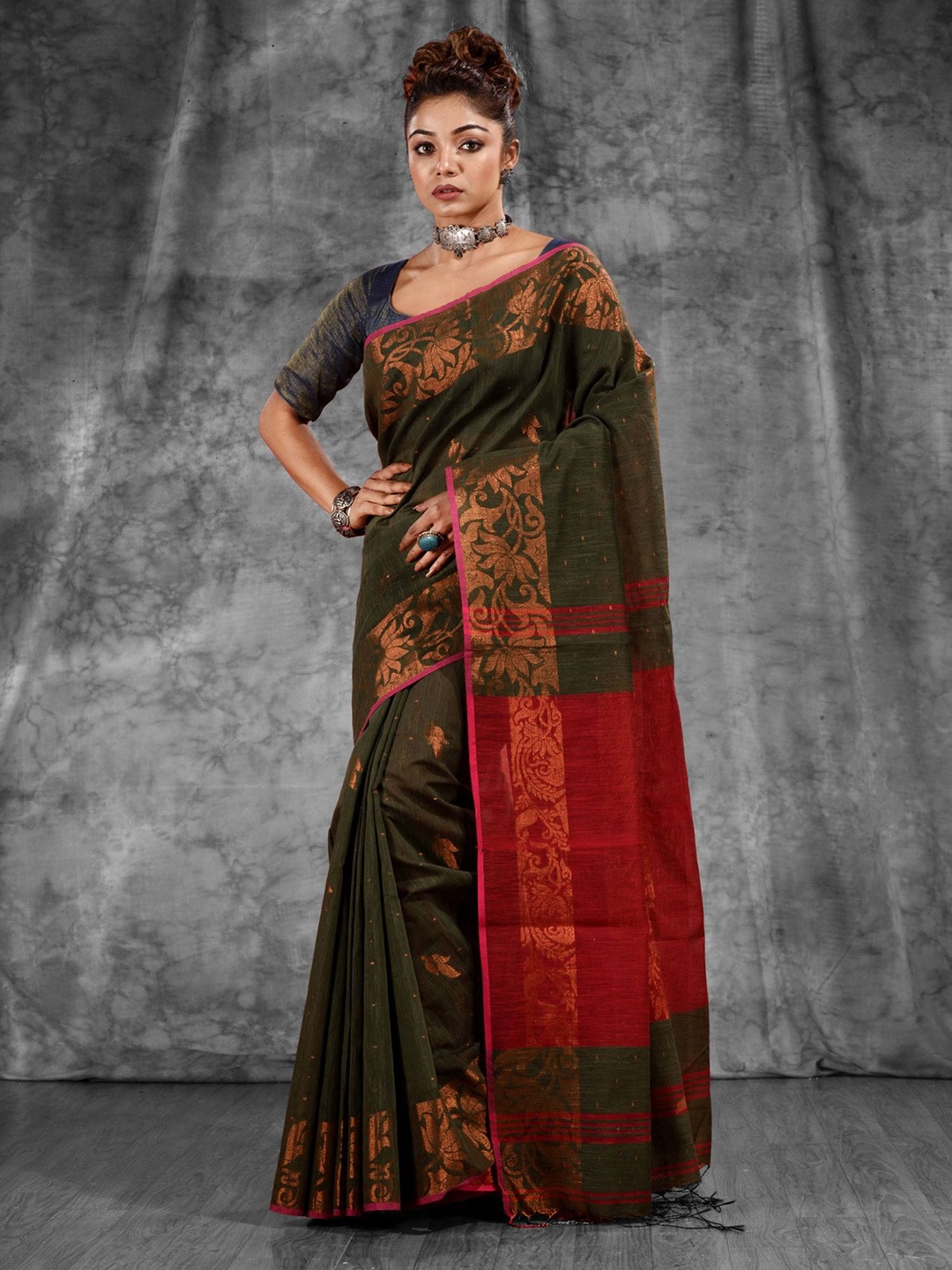 

Charukriti Green & Copper-Toned Woven Design Zari Pure Cotton Saree