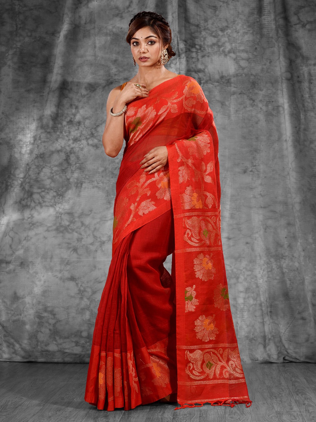

Charukriti Red & Green Woven Design Zari Pure Linen Saree