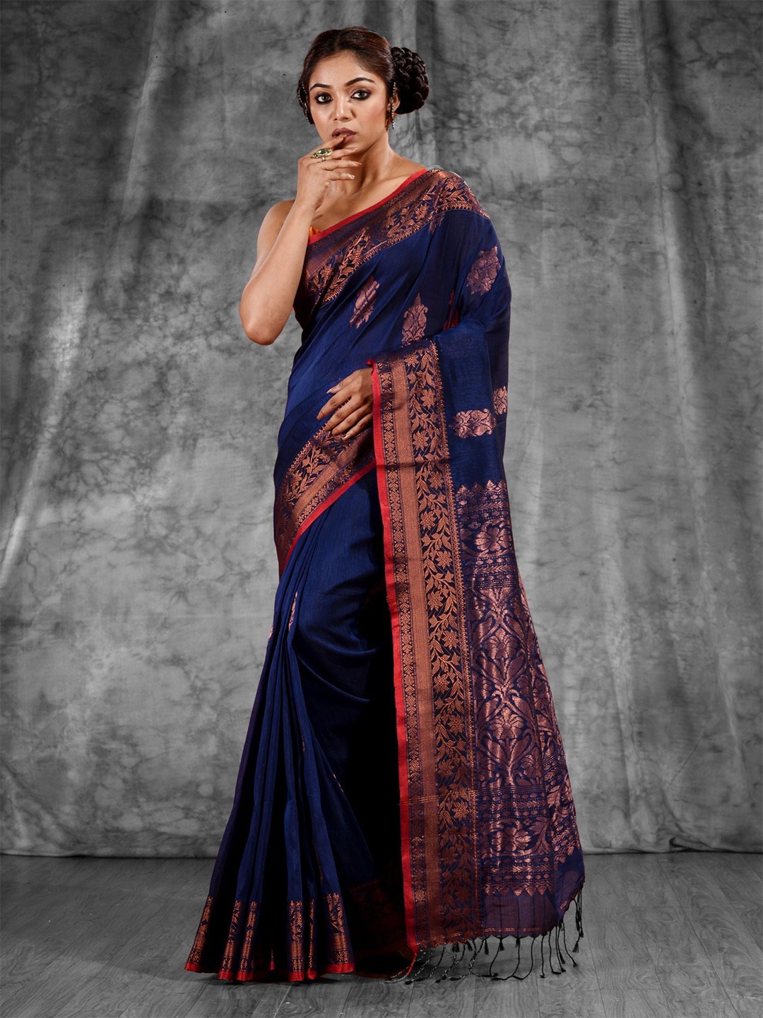 

Charukriti Blue & Copper-Toned Woven Design Zari Pure Linen Saree
