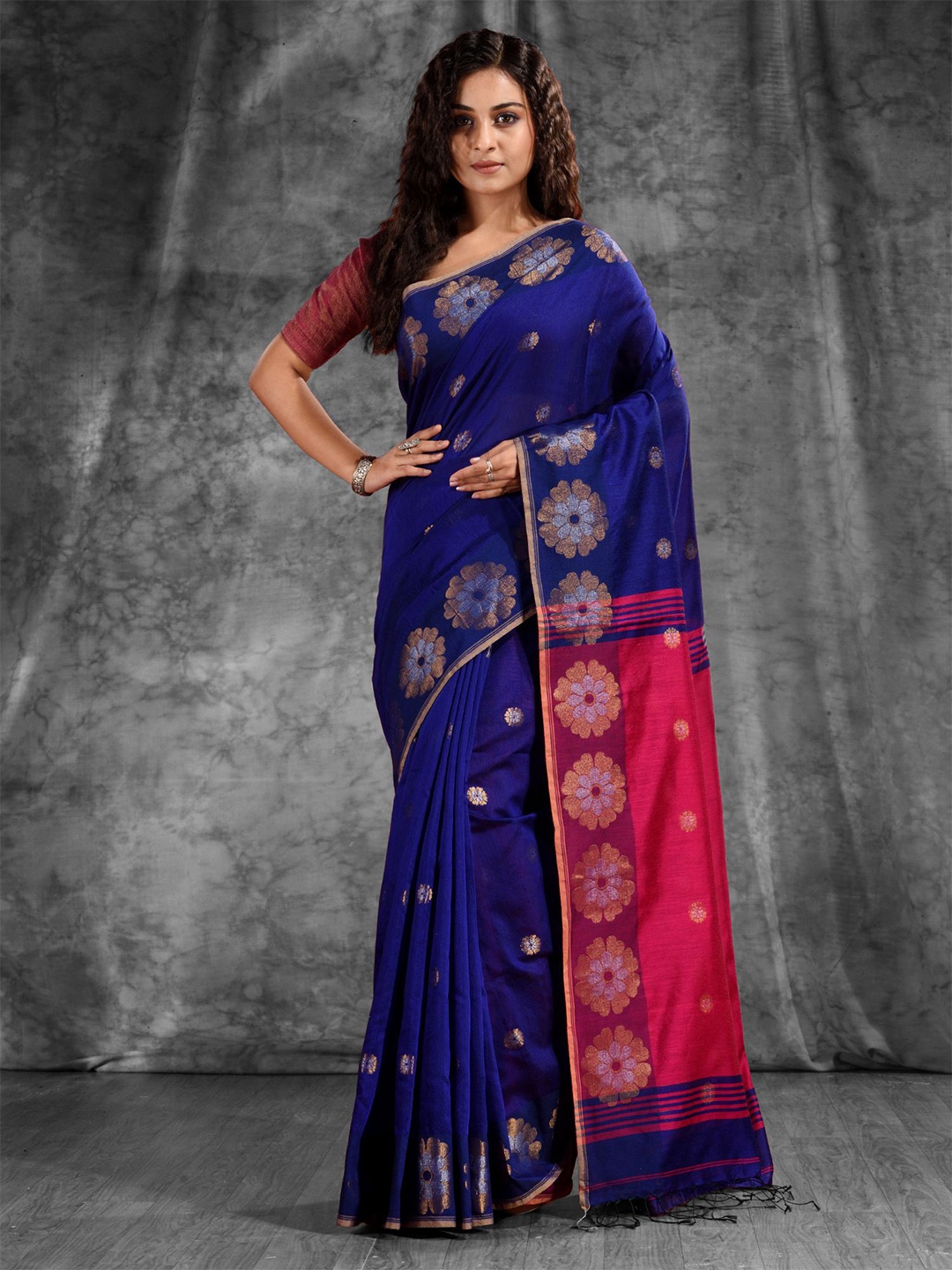 

Charukriti Blue & Pink Woven Design Zari Saree