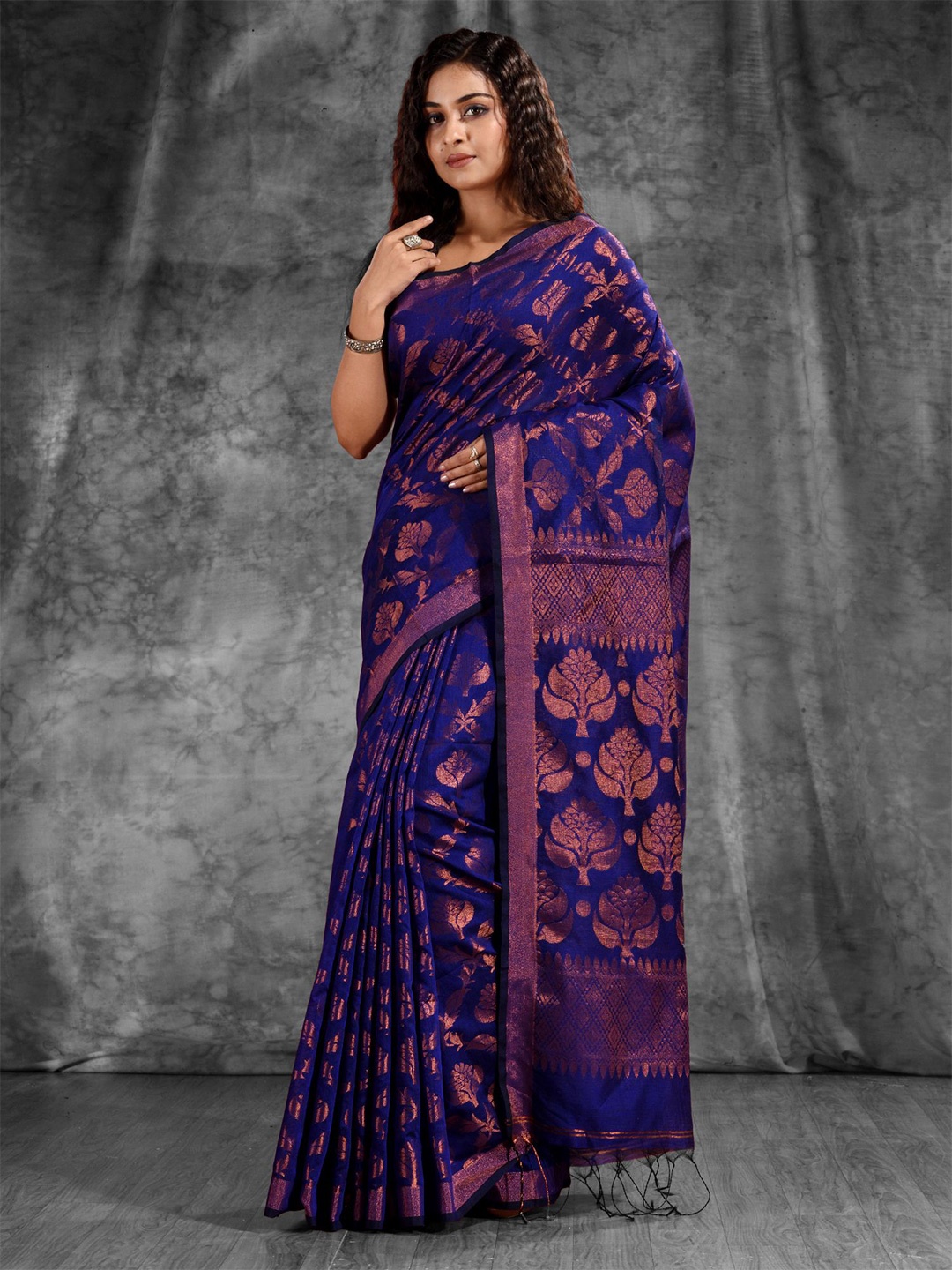 

Charukriti Blue & Gold-Toned Woven Design Zari Saree
