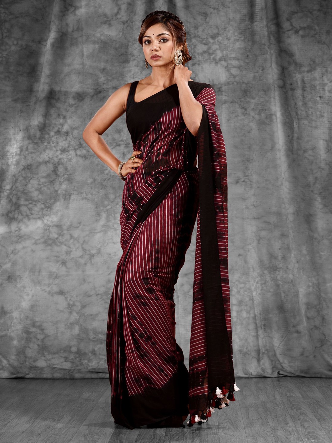

Charukriti Magenta & Black Striped Pure Cotton Saree