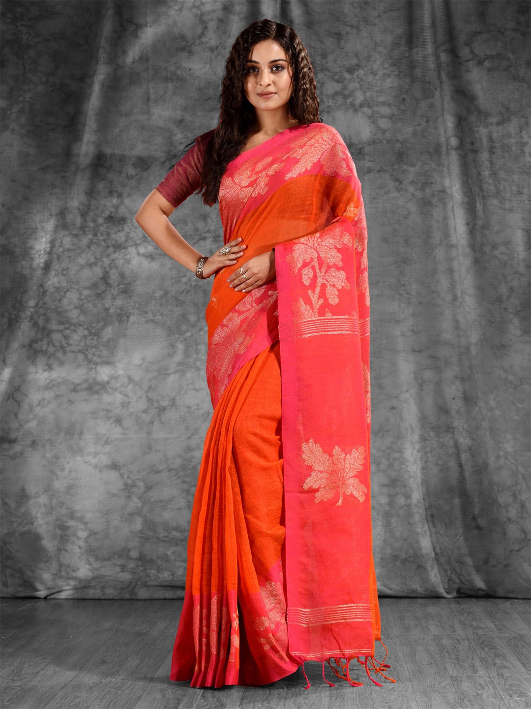 

Charukriti Orange & Pink Woven Design Pure Linen Zari Saree