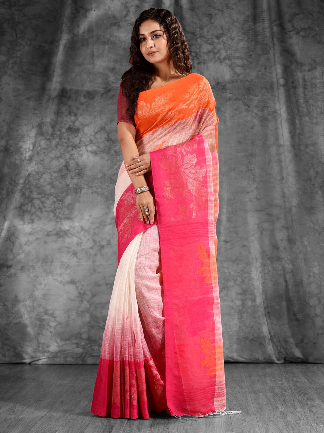 

Charukriti White & Orange Woven Design Pure Linen Zari Saree