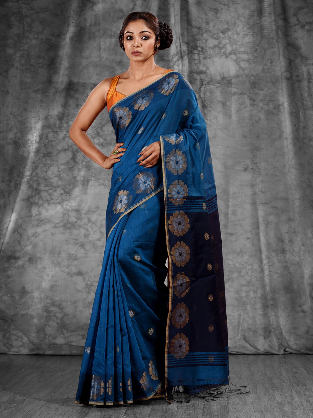 

Charukriti Blue & Gold-Toned Woven Design Zari Saree