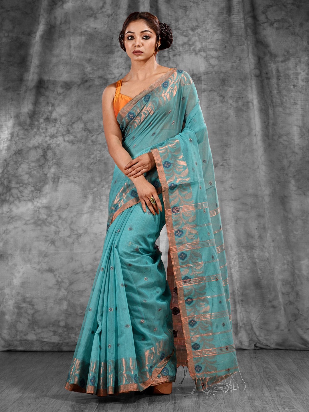 

Charukriti Green & Copper-Toned Woven Design Zari Saree