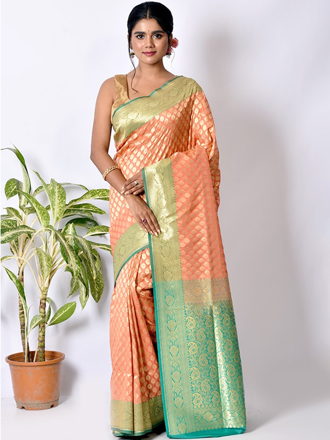 

AllSilks Pink & Green Ethnic Motifs Zari Uppada Saree