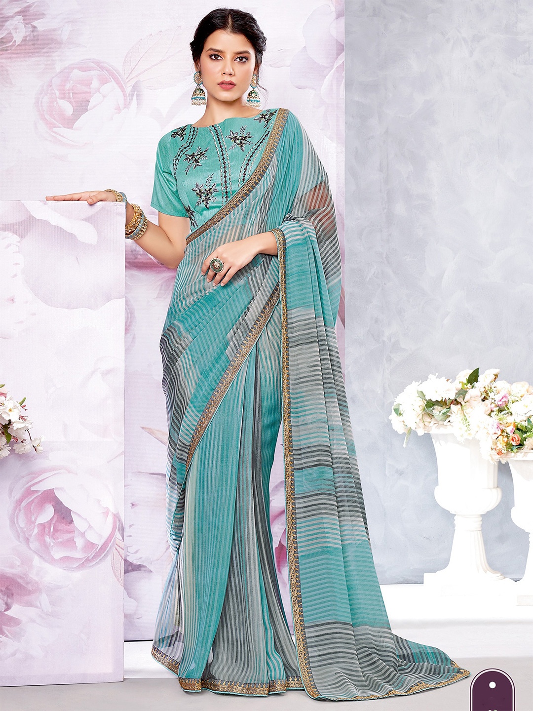 

Shaily Grey & Blue Striped Embroidered Pure Georgette Saree