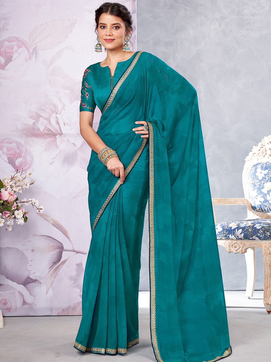 

Shaily Blue & Gold-Toned Embroidered Pure Georgette Saree