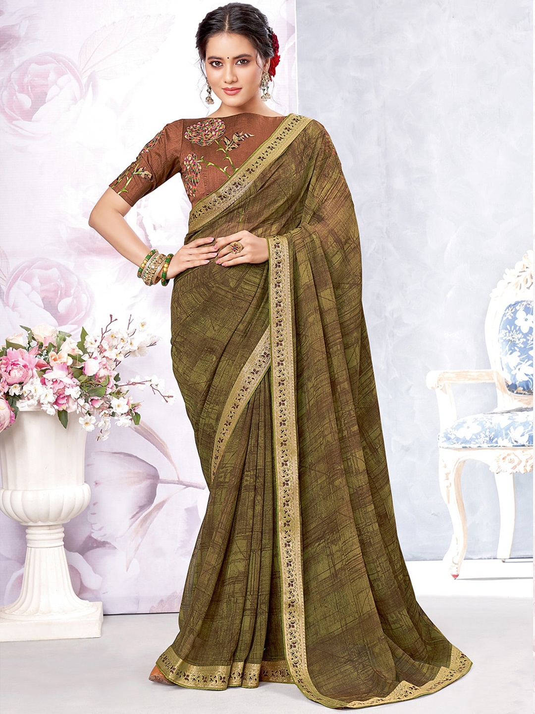 

Shaily Olive Green & Gold-Toned Zari Pure Georgette Saree