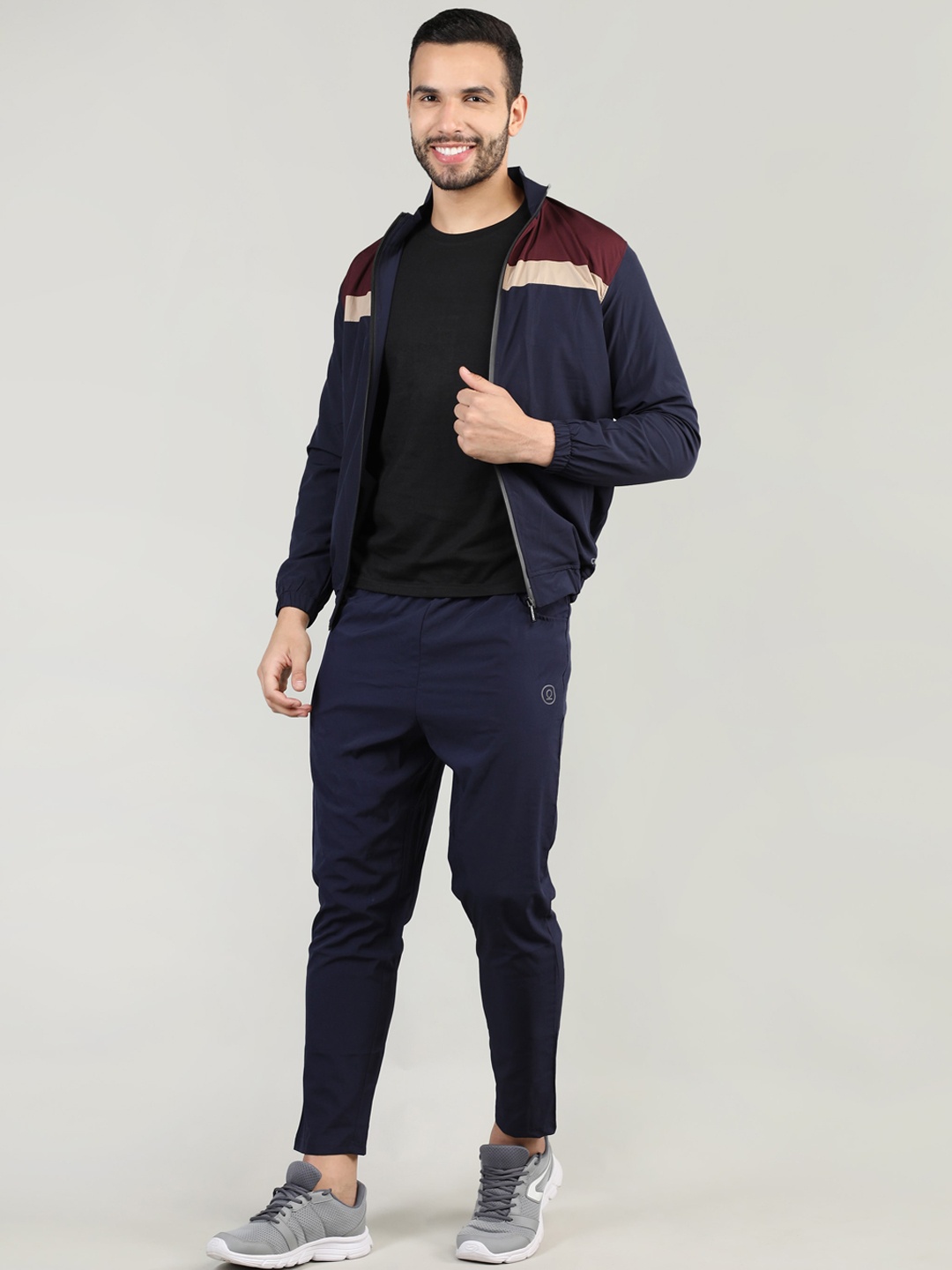 

CHKOKKO Men Navy Blue & Maroon Colorblocked Windcheater Tracksuit