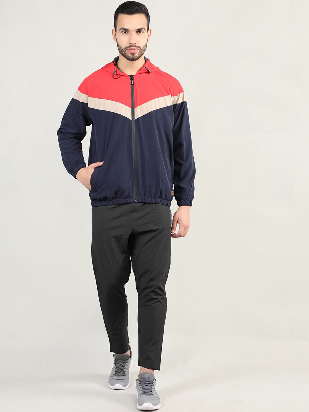 

CHKOKKO Men Red & Navy Blue Color Blocked Windcheater Tracksuit