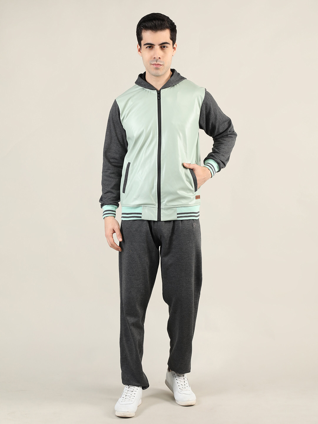 

CHKOKKO Men Green & Grey Melange Colorblocked Hooded Tracksuit