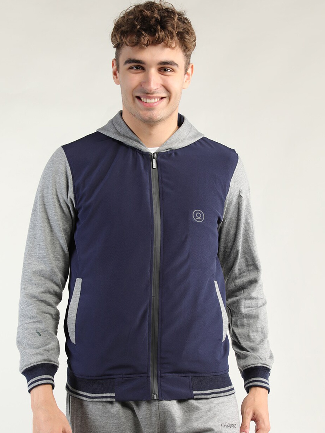 

CHKOKKO Men Navy Blue & Grey Colourblocked Cotton Bomber Jacket