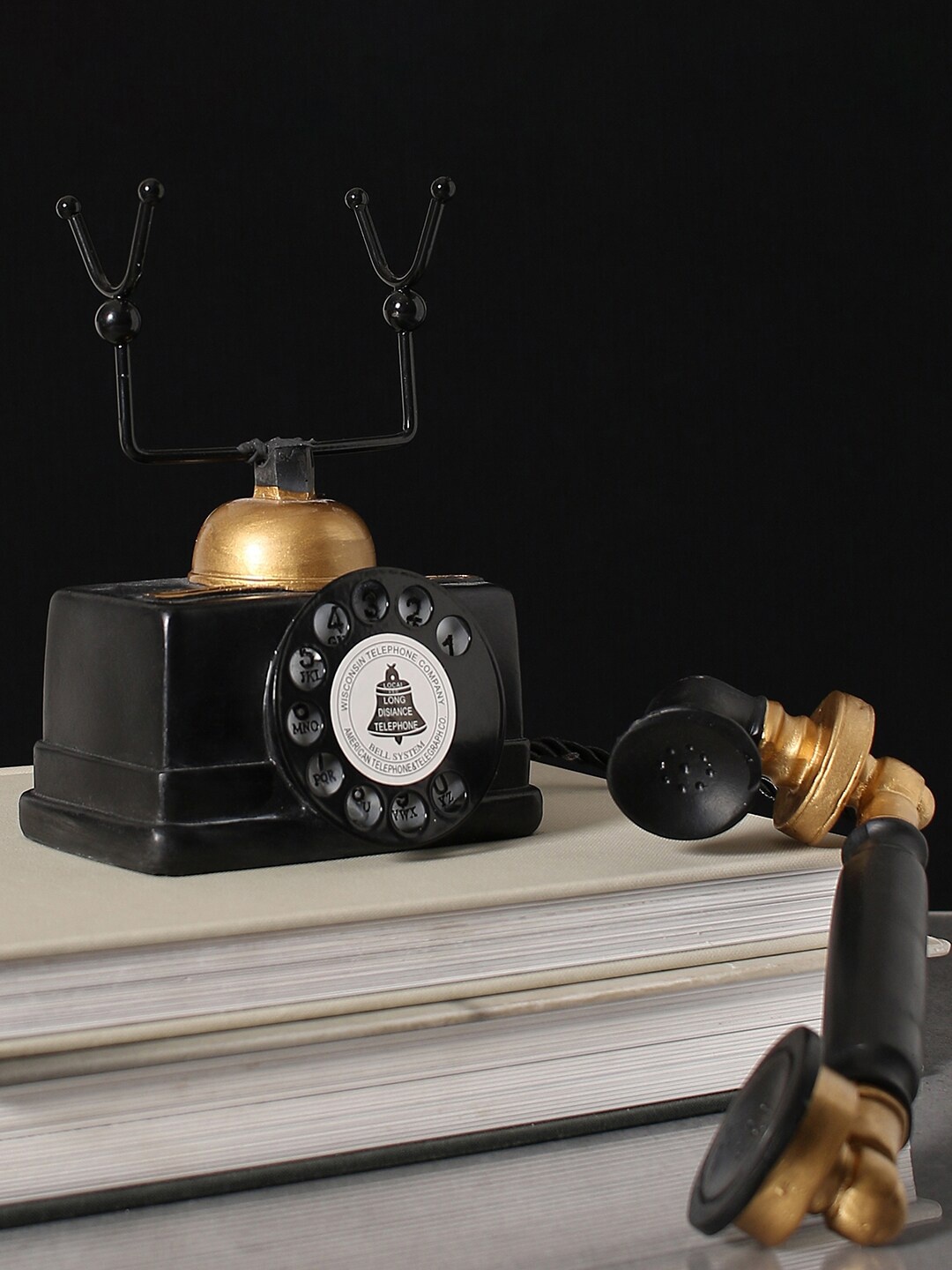 

Bonhomie Black & Gold Toned Vintage Telephone Sculpture Showpiece