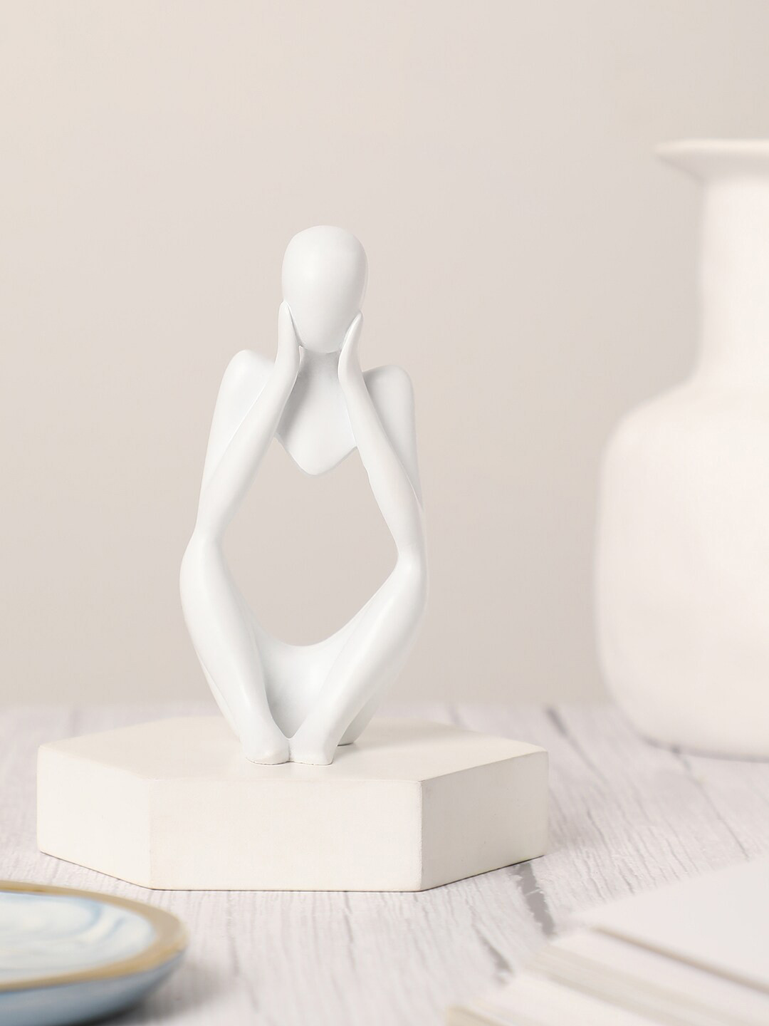 

Bonhomie White Ceramic Figurine Showpiece