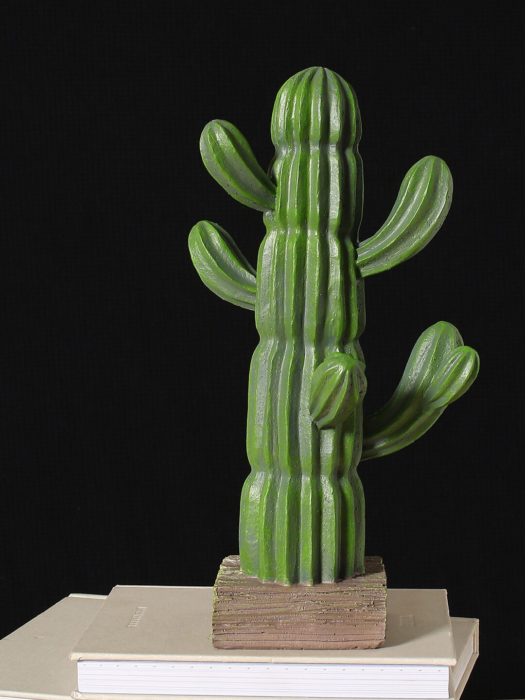 

Bonhomie Green Faux Cactus on Wooden Stand Showpieces