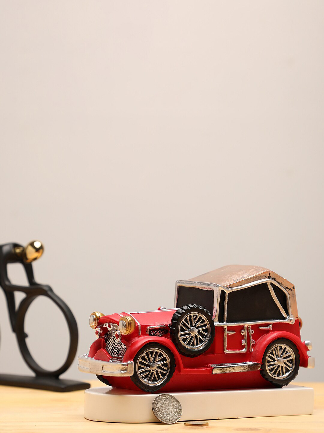 

Bonhomie Red Vintage Car Sculpture Showpiece