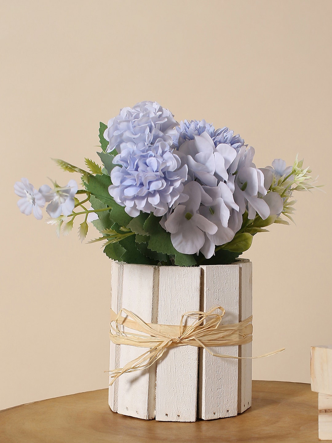 

Bonhomie Blue & Beige Faux Flowers in Wooden Crate Pot
