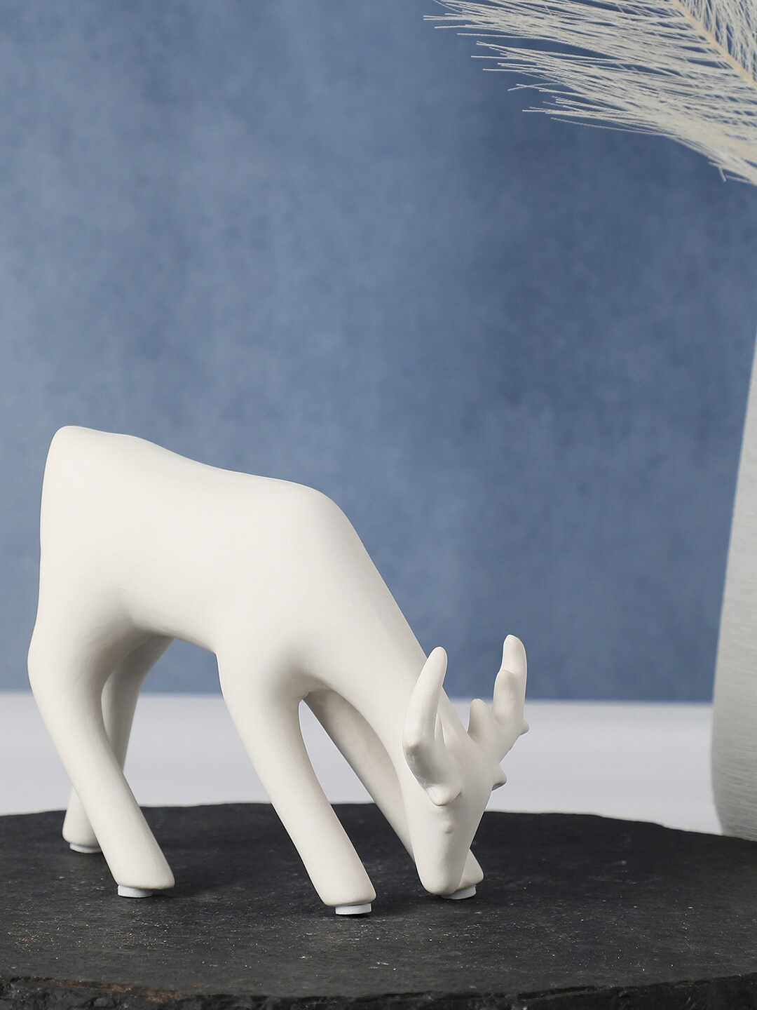 

Bonhomie White Reindeer Shaped Ceramic Showpieces
