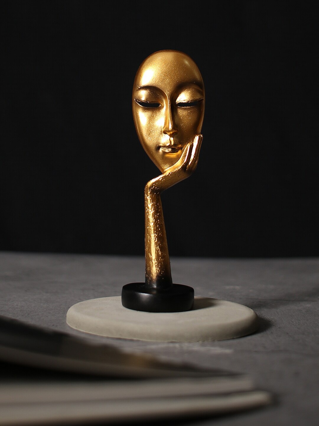 

Bonhomie Gold Toned & Black Women Face Ceramic Figurine Showpieces