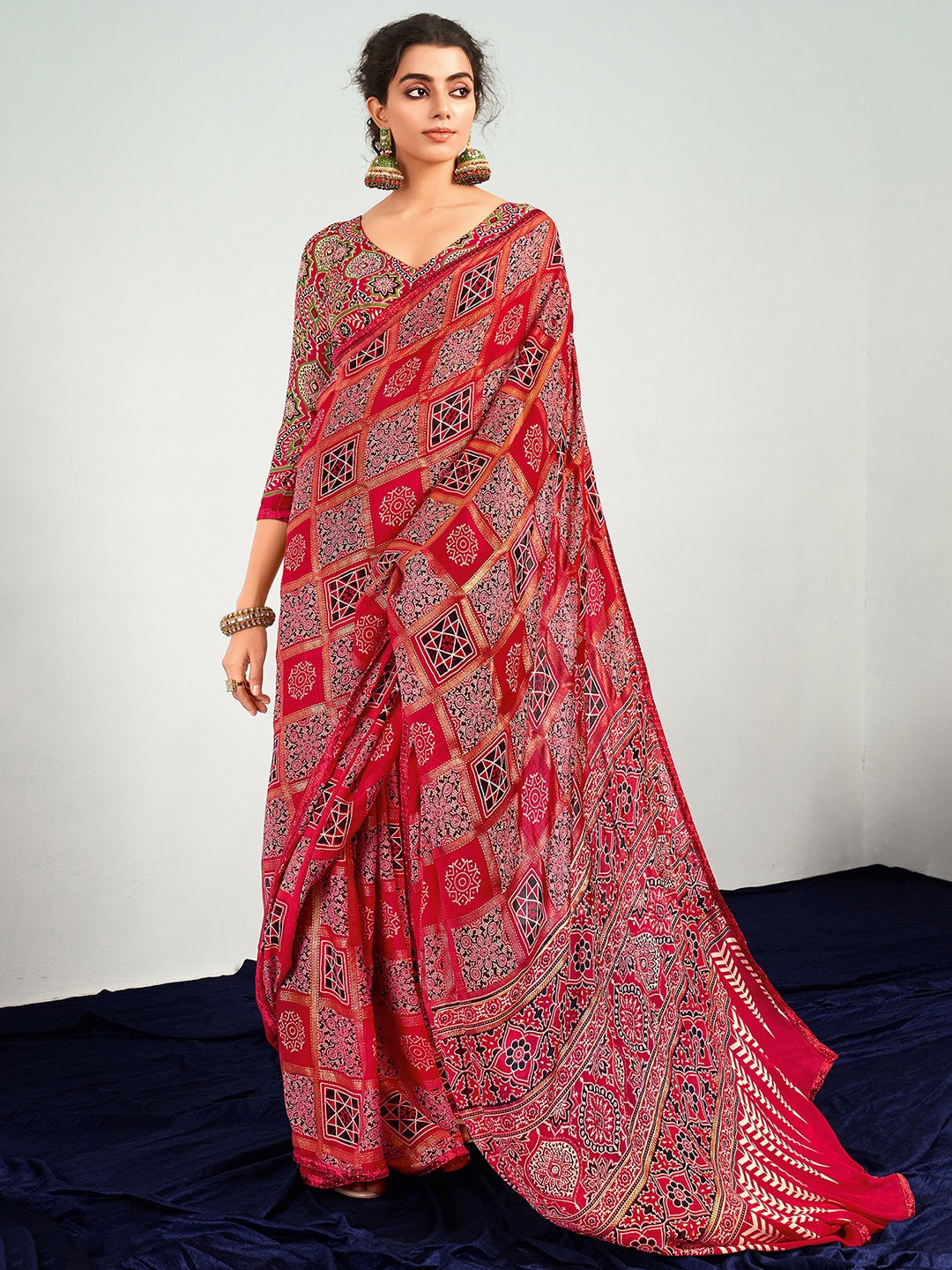 

Saree mall Pink & Black Zari Pure Georgette Patola Saree