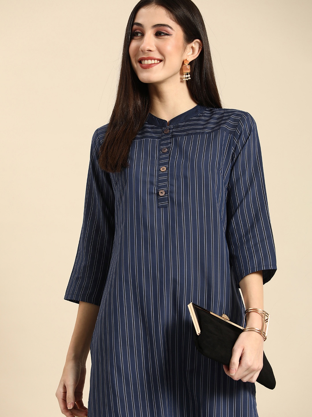 

Anouk Women Striped Mandarin Collar Kurta with Trousers, Navy blue